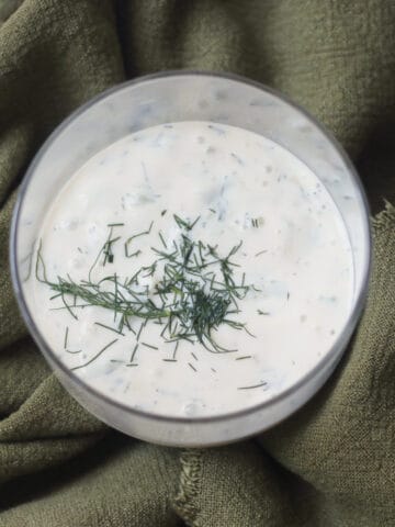 Vegan tzatziki in a small glass bowl