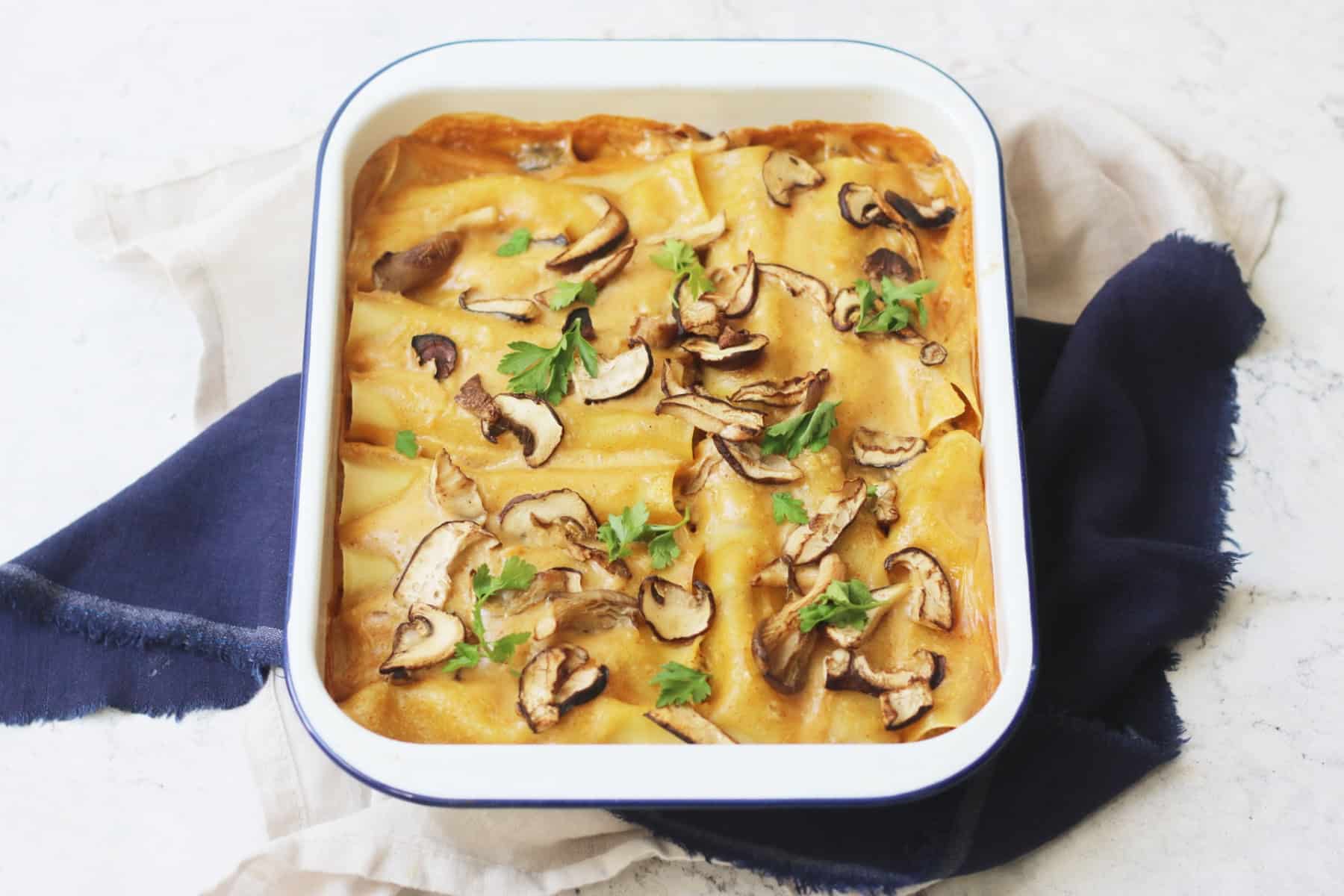 Vegan Mushroom Cannelloni topped with crispy mushrooms and parsley