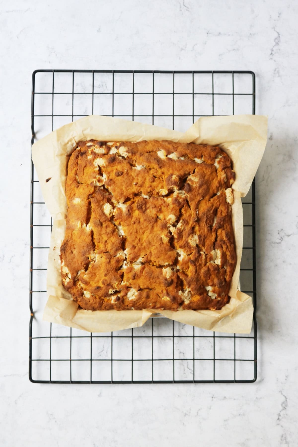 Pan of Vegan Pumpkin Spice Blondies cooling on a wire rack
