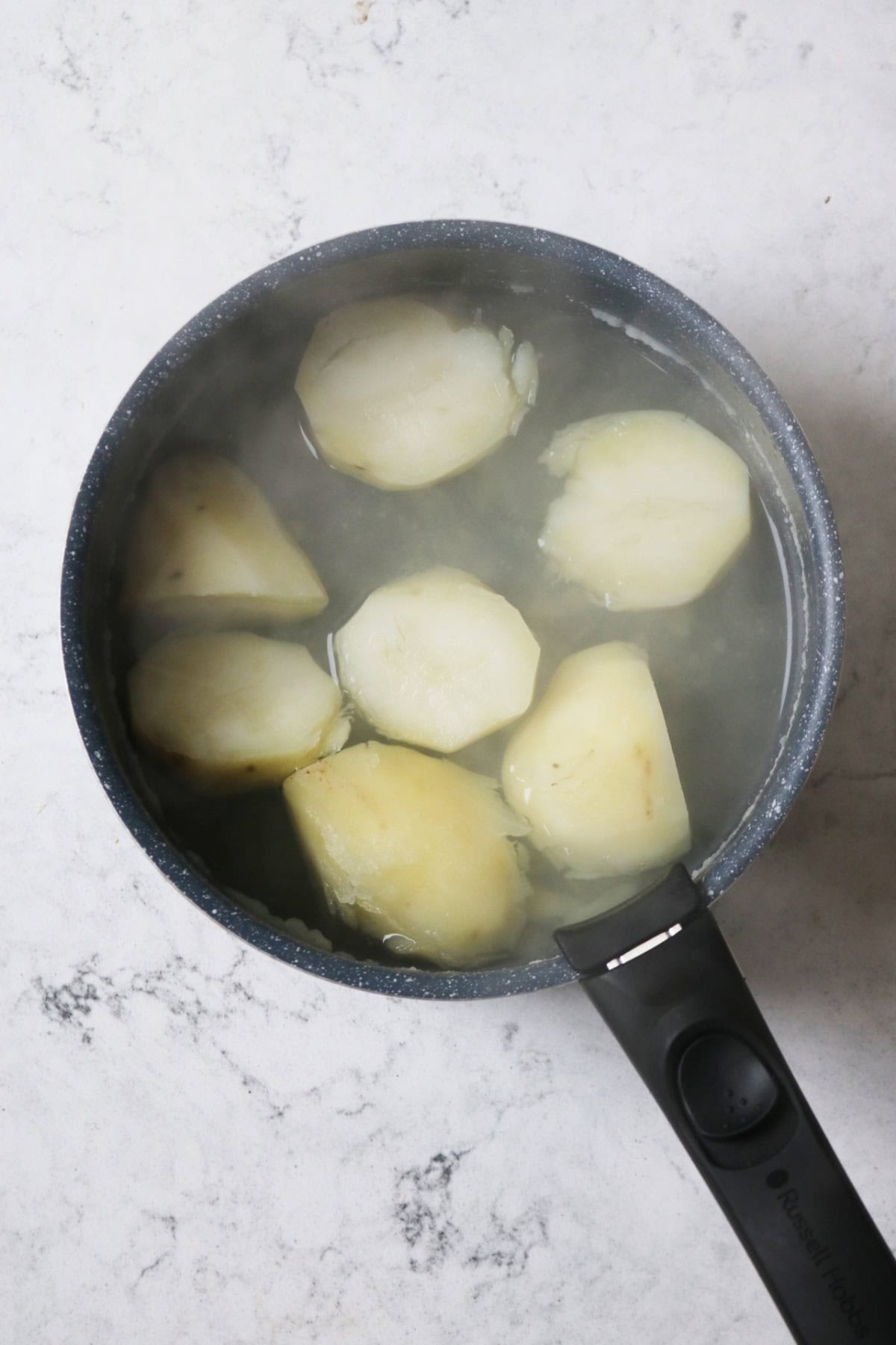 Boiled potatoes in a saucepan