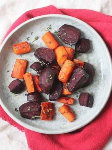 Roasted Beetroot and Carrots with Balsamic and thyme on a plate