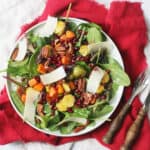 Festive Salad on a large white plate on top of a red napkin