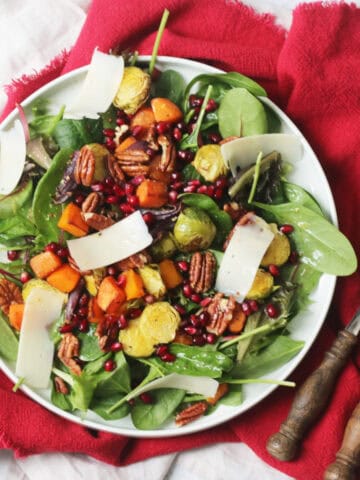 Festive Salad on a large white plate on top of a red napkin