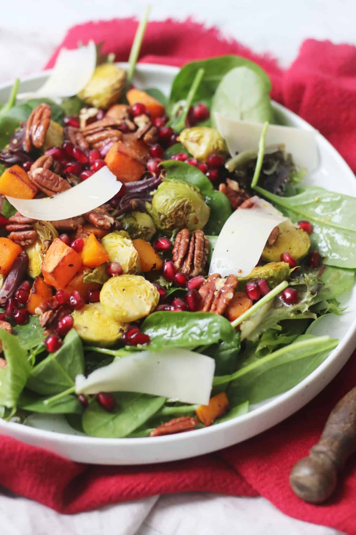 Festive Salad on a large white plate on top of a red napkin