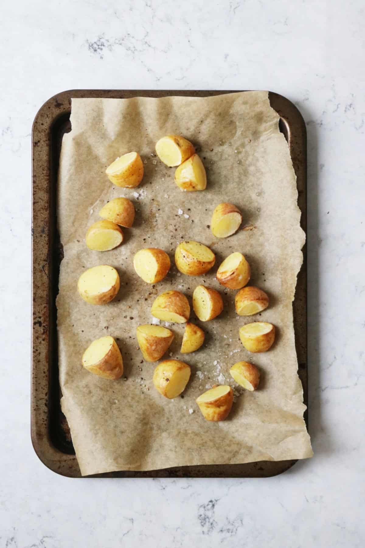 Roasted potatoes on a baking tray