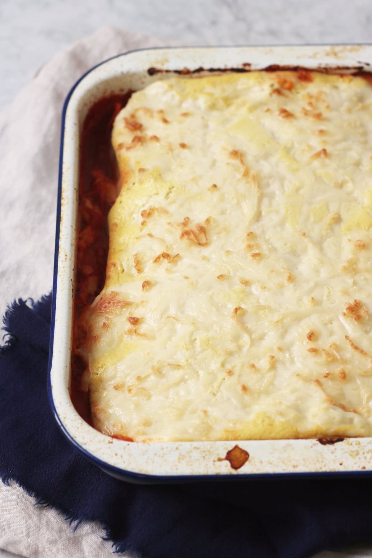 A close up of a whole Vegan Roasted Vegetable Lasagne straight out of the oven.
