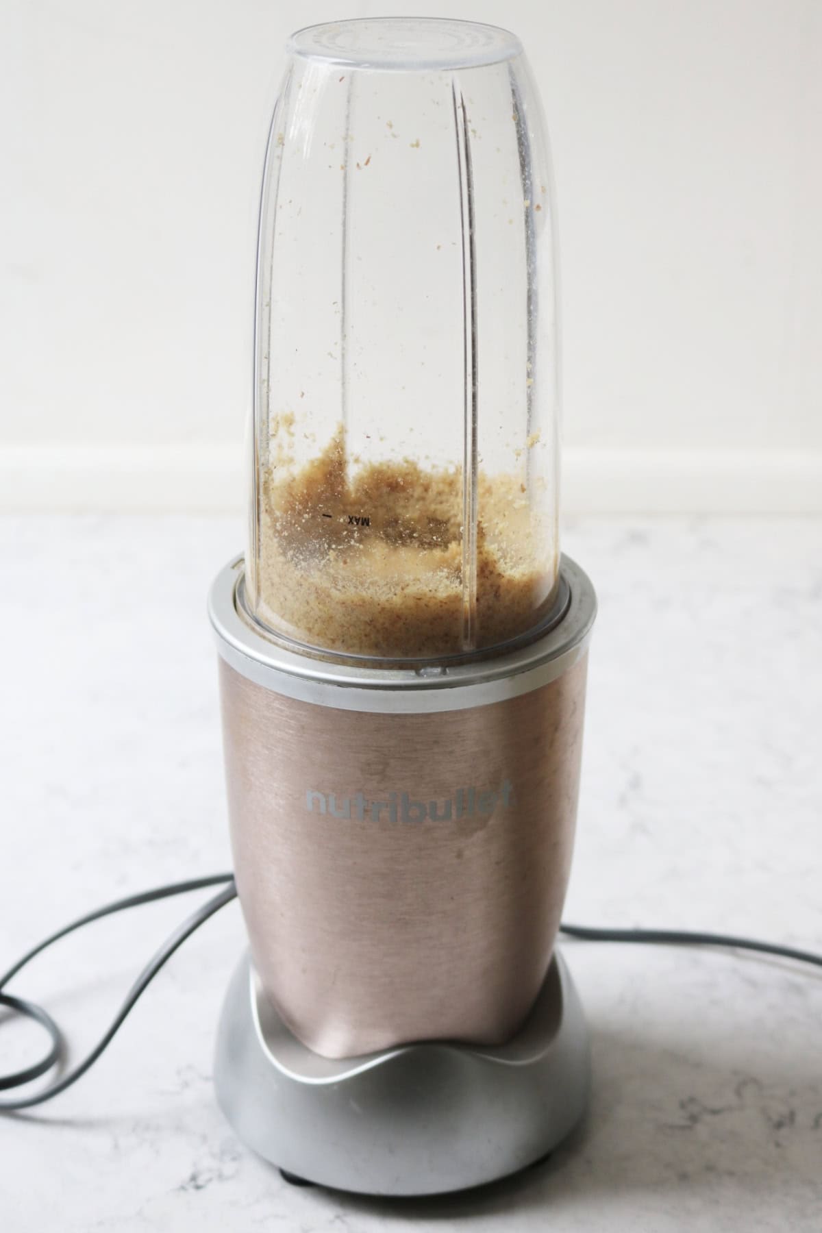 Toasted walnuts that have been ground in a Nutribullet