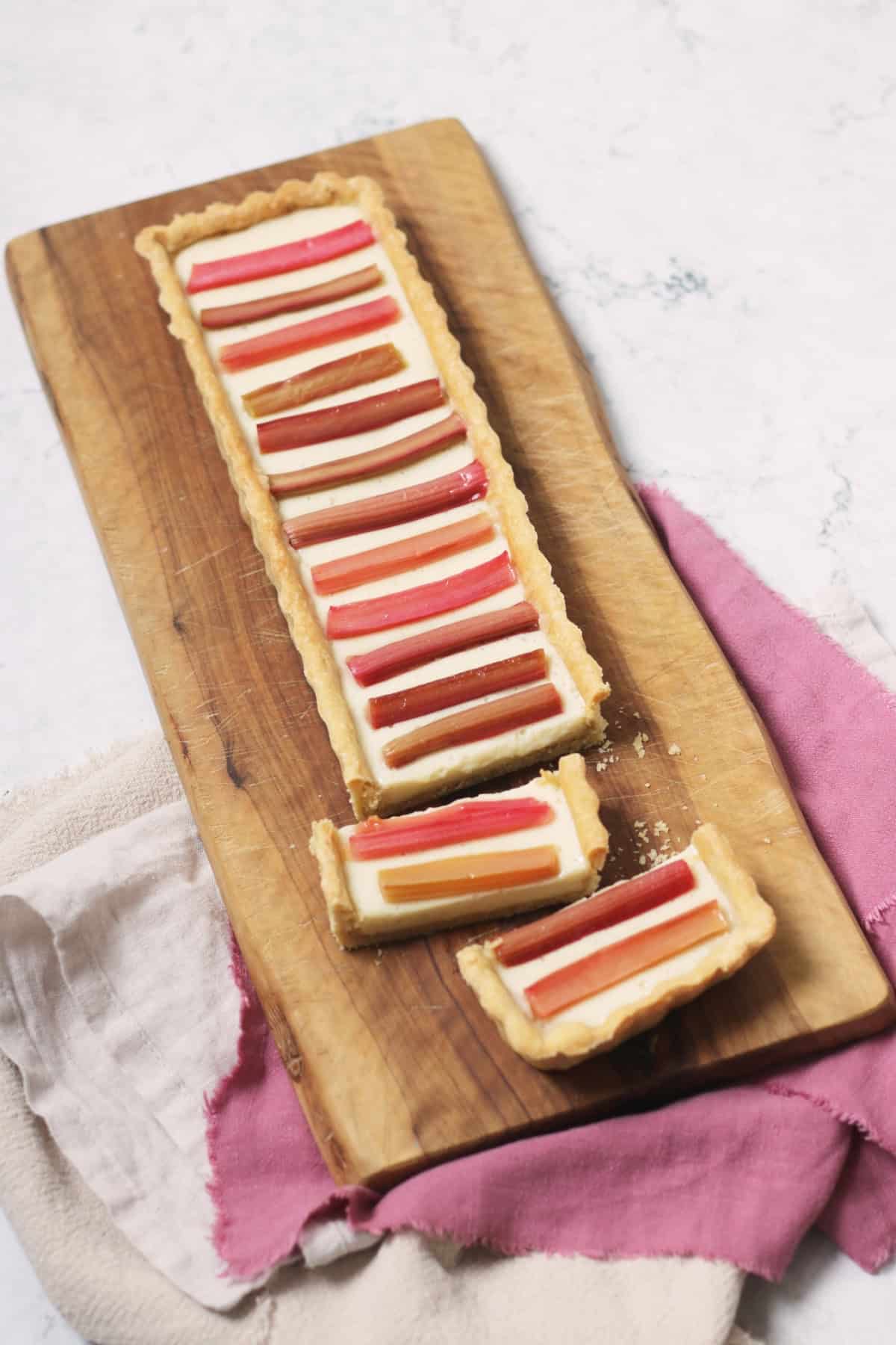 Slices of a rectangular Vegan Rhubarb and Custard Tart