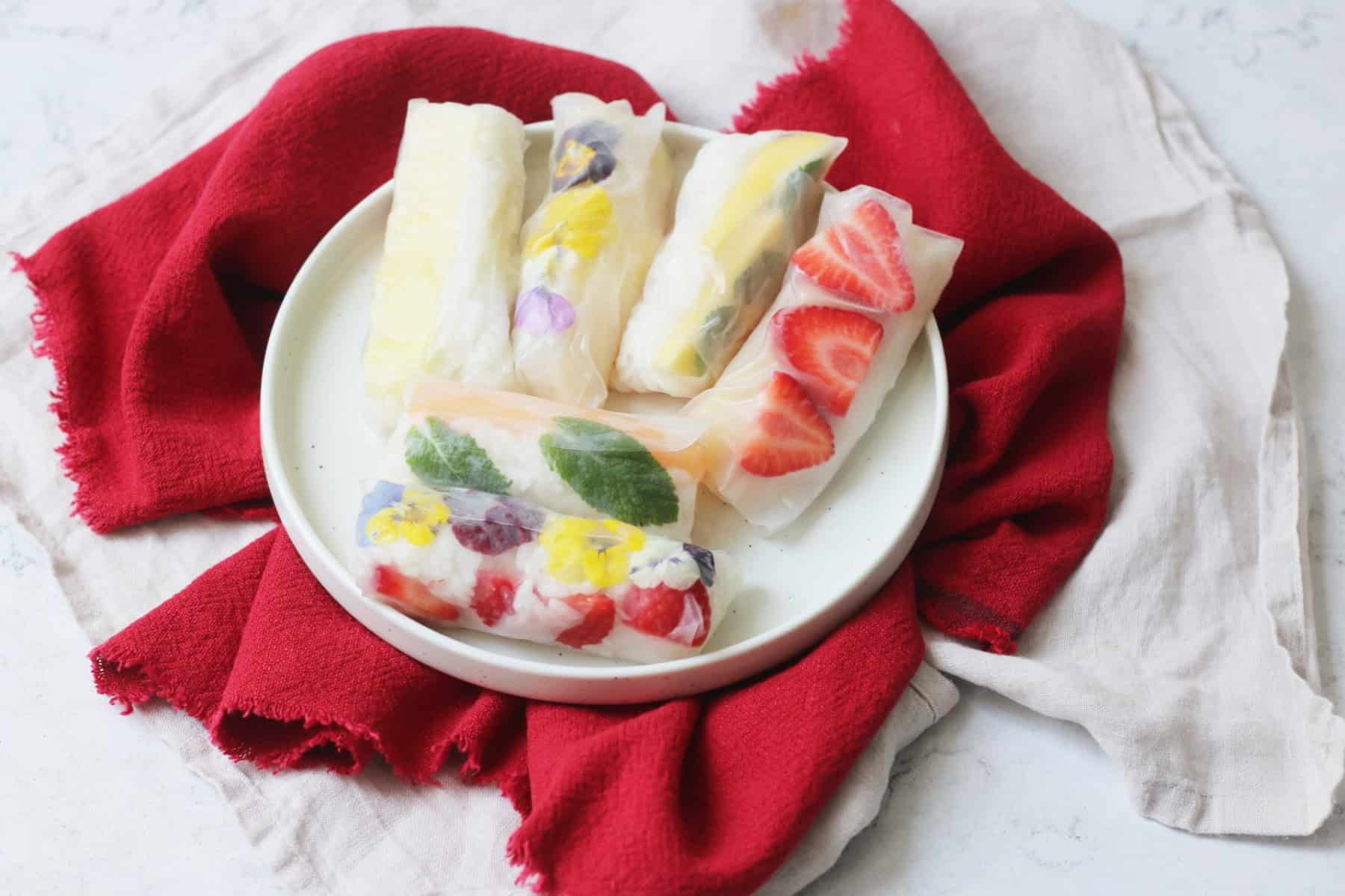 A platter of Vegan Sweet Summer Rolls on a red napkin