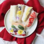 A platter of Vegan Sweet Summer Rolls on a red napkin