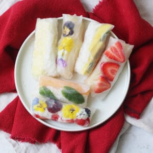 A platter of Vegan Sweet Summer Rolls on a red napkin