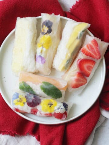 A platter of Vegan Sweet Summer Rolls on a red napkin