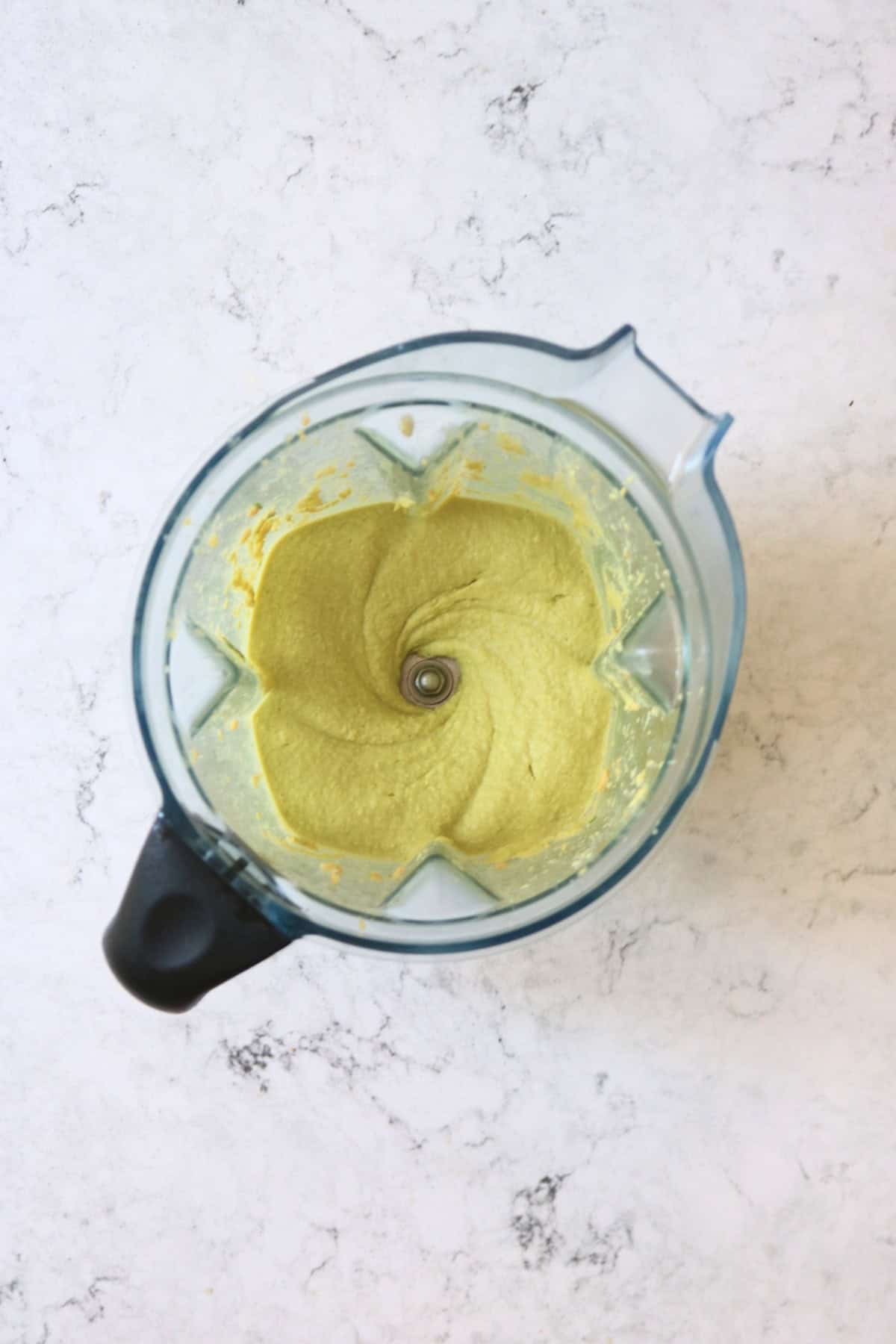 Roasted Garlic and Basil Hummus in a blender