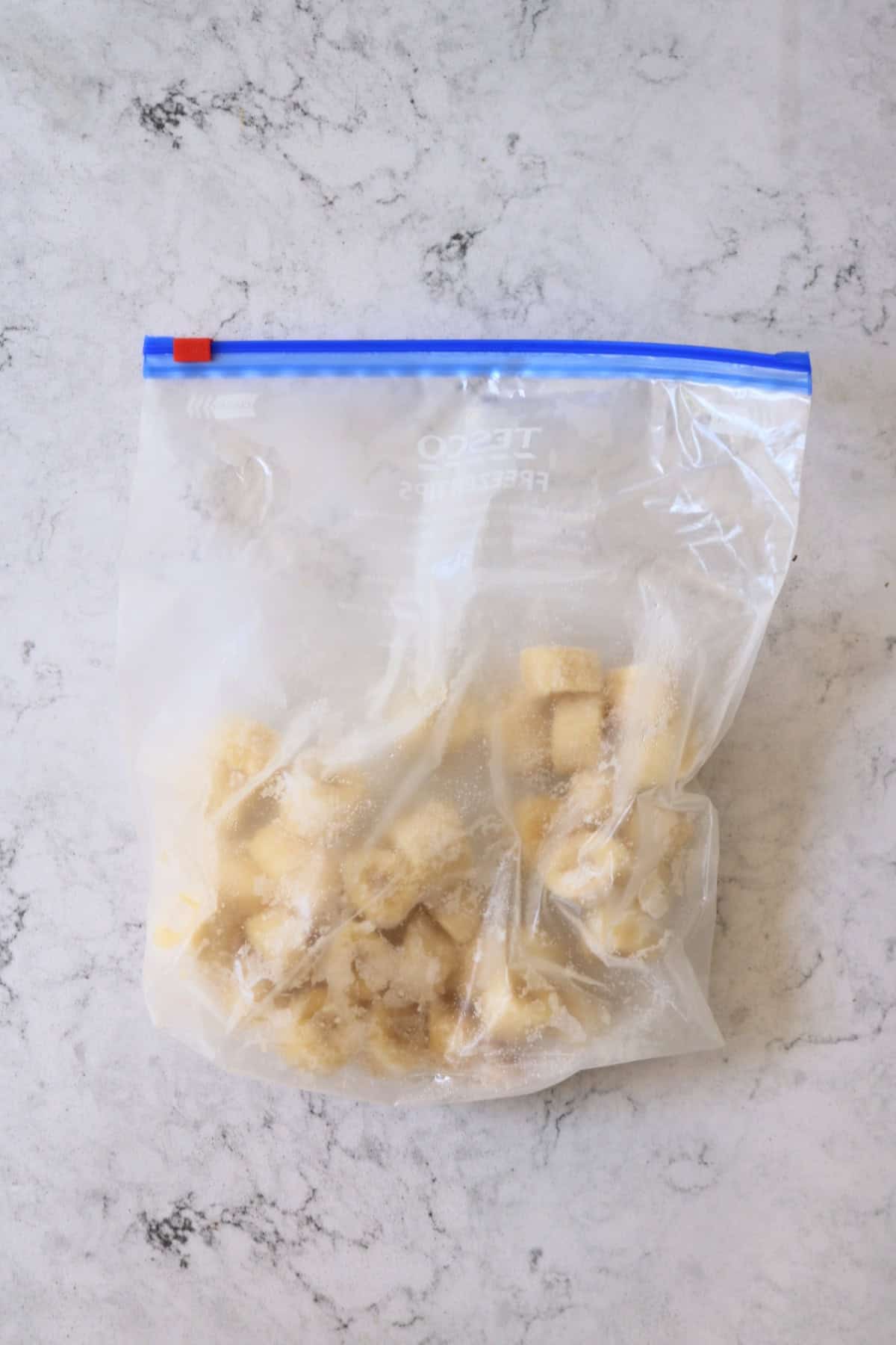 Slices of frozen banana in a Ziploc bag