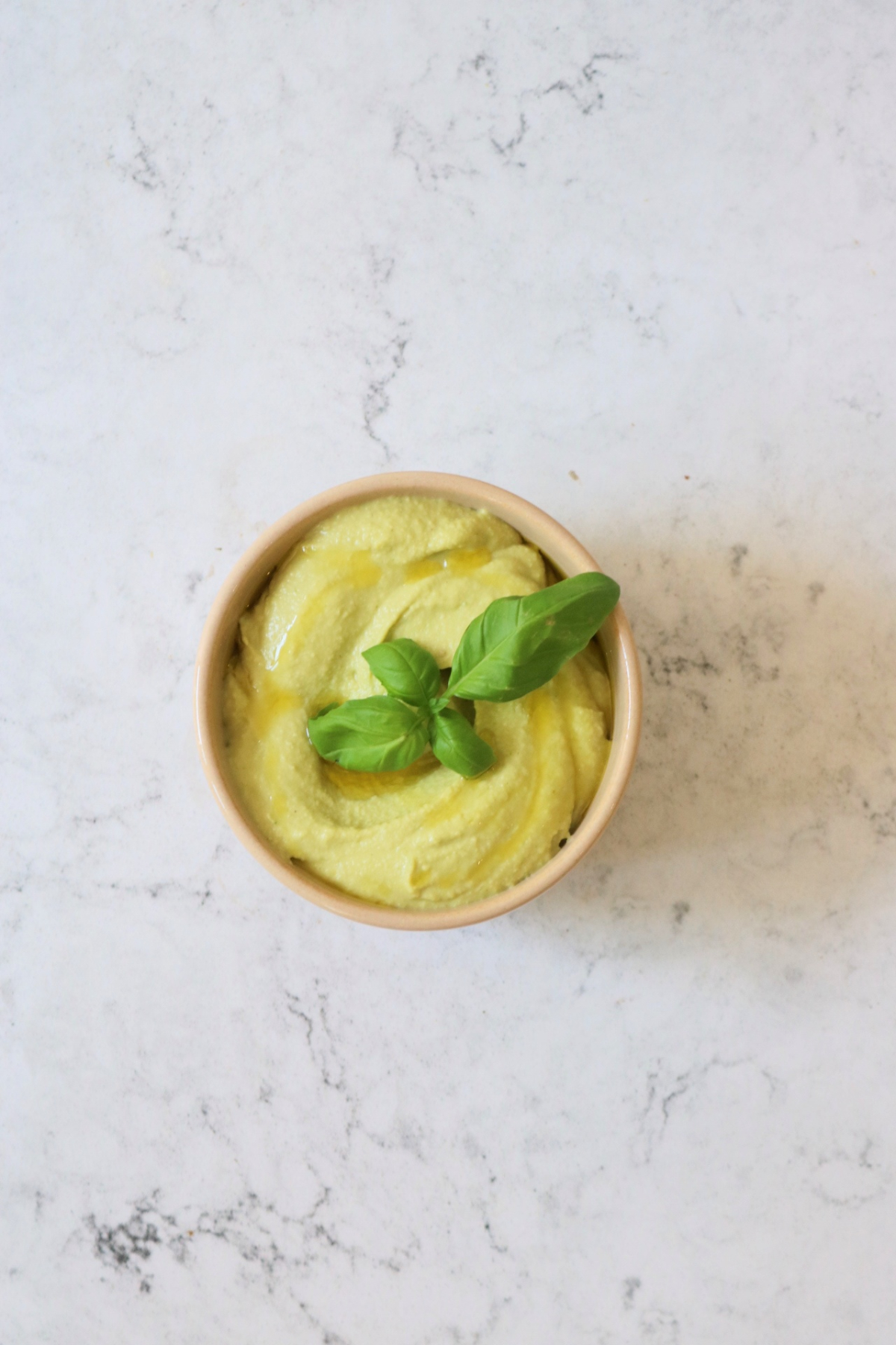 Roasted Garlic and Basil Hummus in a bowl