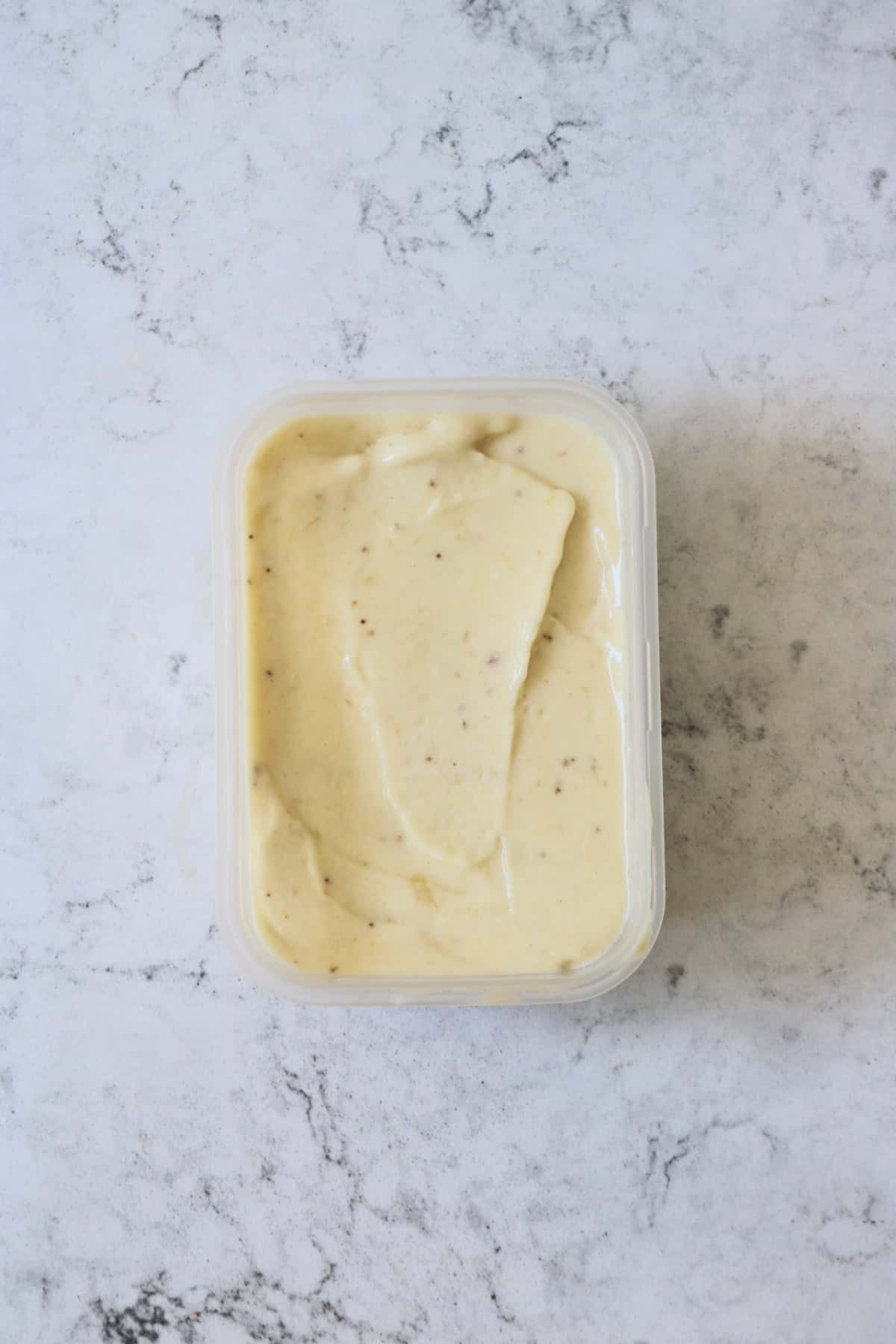 A tub of frozen Vegan Banana and Coconut Ice Cream