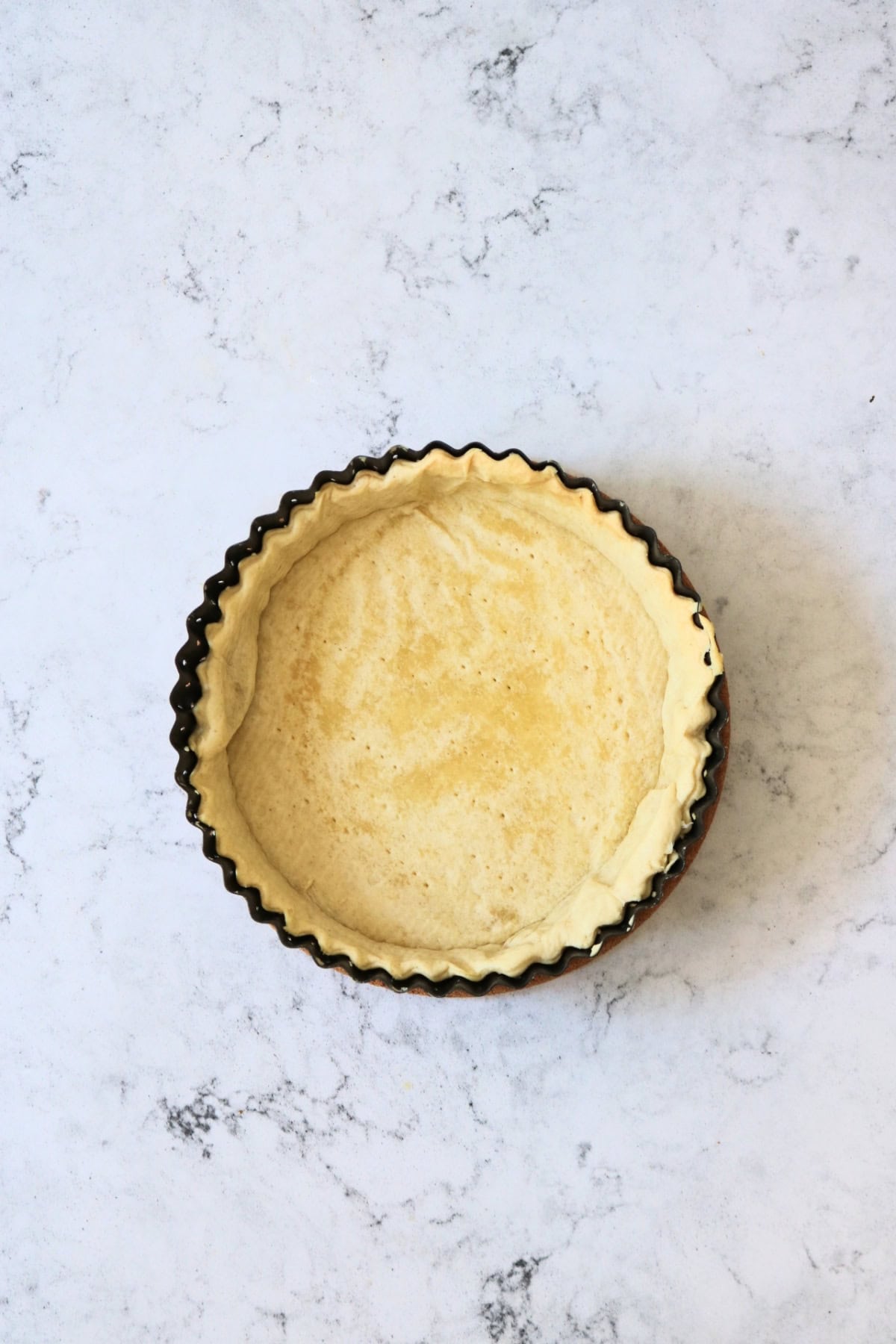 A baked shortcrust pastry case