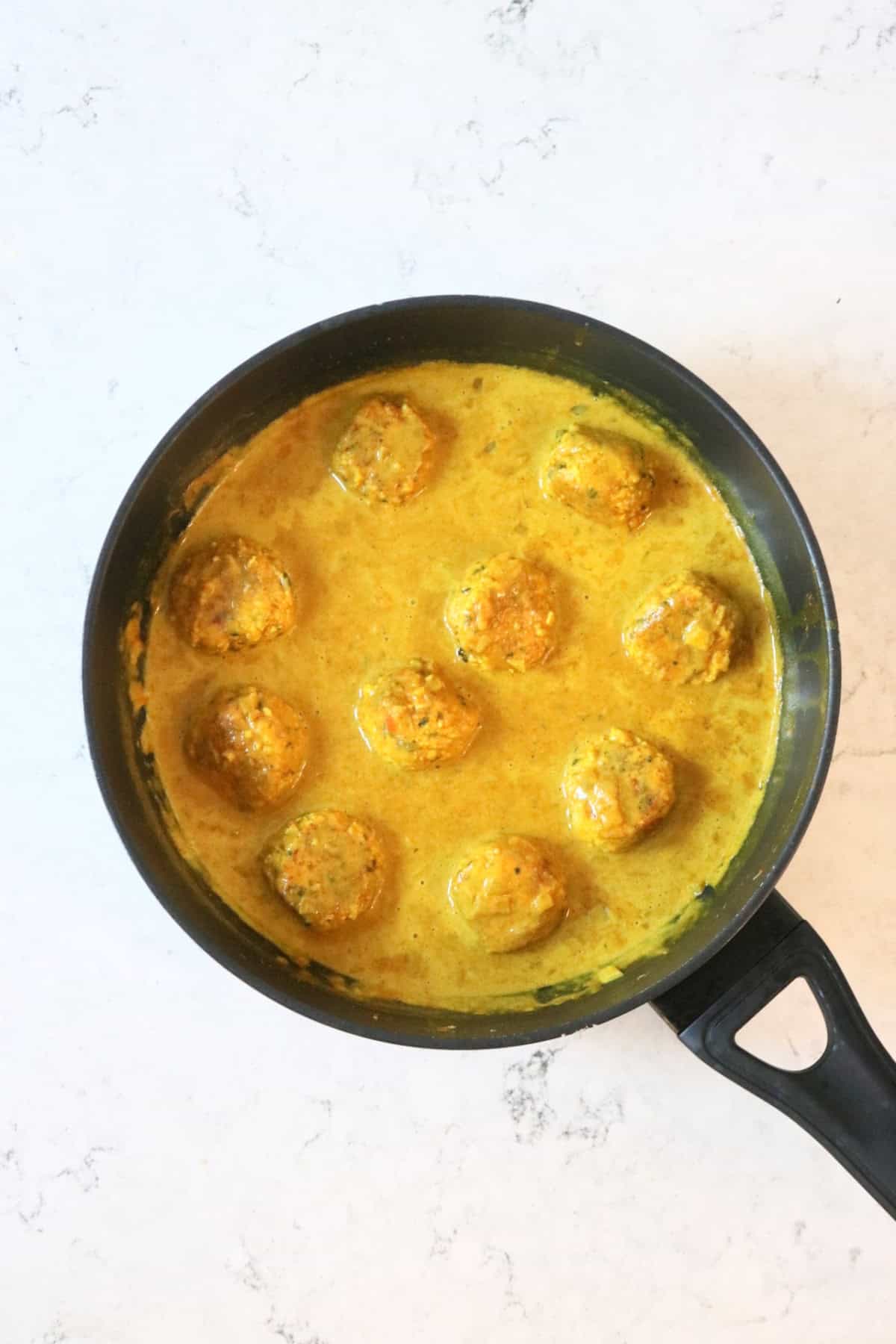 Vegan Fish Balls simmering in their sauce