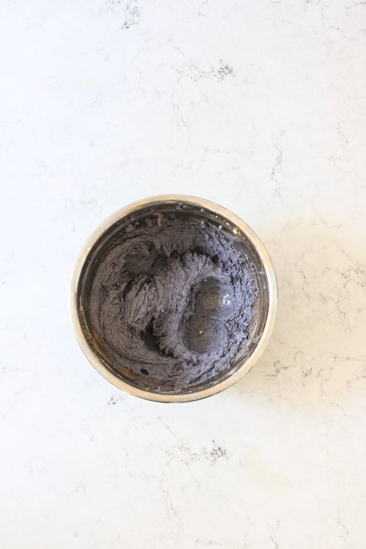 Vegan Halloween Pumpkin Spice Rolls filling in a small metal bowl